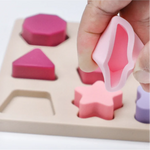 Puzzle bébé Montessori en silicone formes aux couleurs pastel - Vignette | Le Poussin Ludique