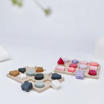 Puzzle bébé Montessori en silicone formes aux couleurs pastel - Vignette | Le Poussin Ludique